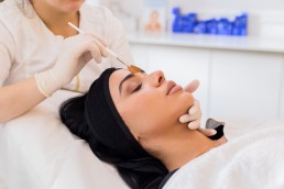 woman receiving bespoke facial at Avanti Aesthetics Clinic