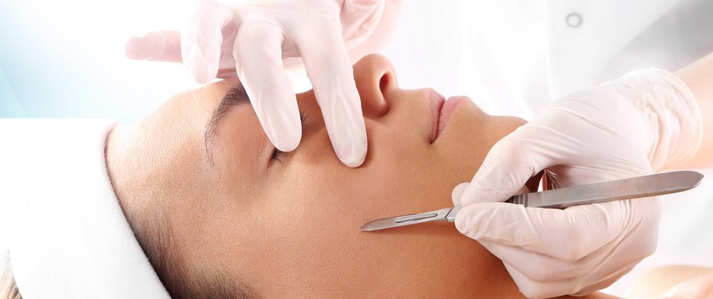 woman receiving dermaplane facial at Avanti Aestehtics Clinic